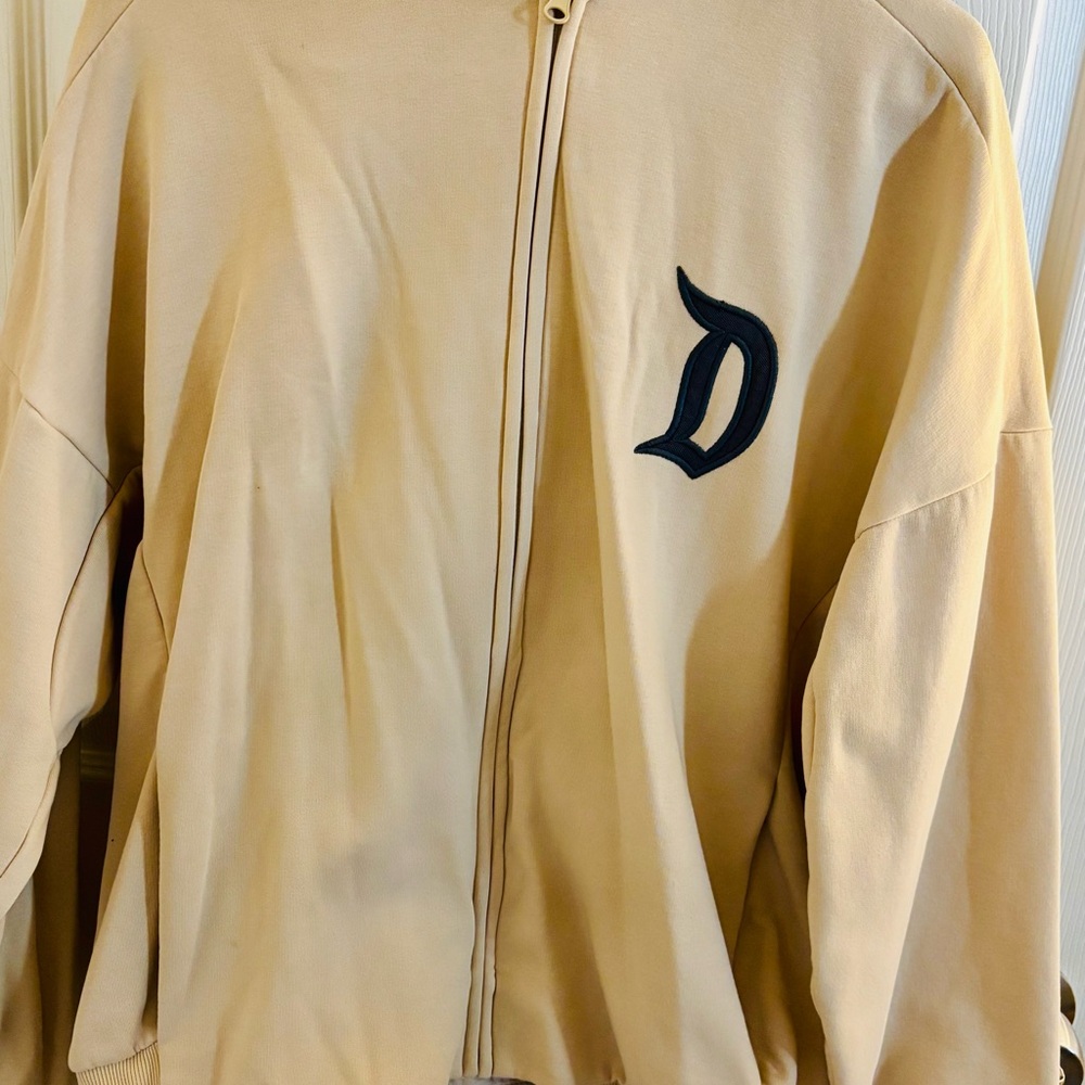 Beige Zip-Up Jacket with D Logo